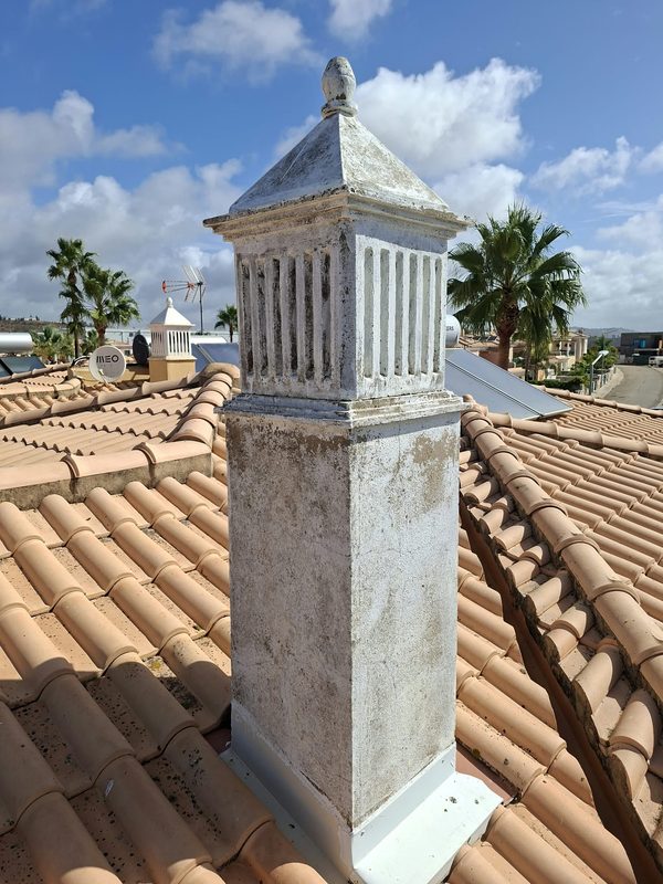 Before — chimney 1. Paint lifting off the shaft, dirt in the slots.